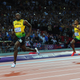 Illustration for article titled Photos Of Usain Bolt Looking Bored As He Blows Past The Best Runners In The World